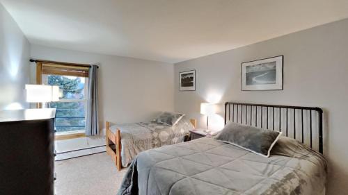 Ένα ή περισσότερα κρεβάτια σε δωμάτιο στο AA302 Buffalo Village