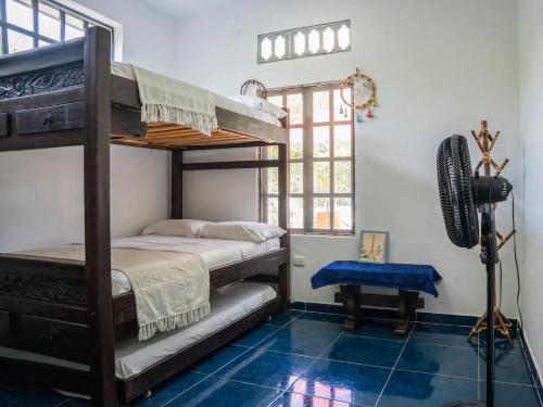 Ένα ή περισσότερα κρεβάτια σε δωμάτιο στο villa campestre las palmas