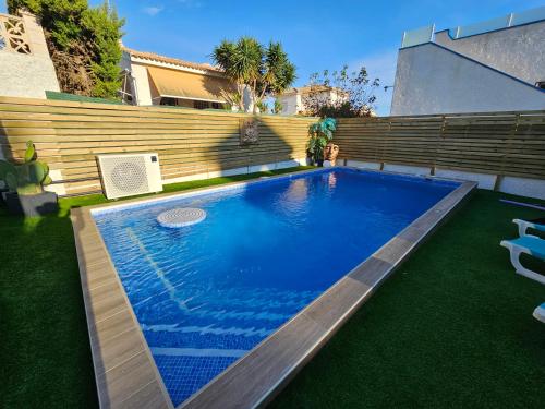 Private Villa with Heated Swimming Pool, Roof Top Solarium & Garden