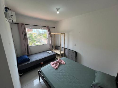 Postel nebo postele na pokoji v ubytování Brasil Coroa e Villa dos Corais