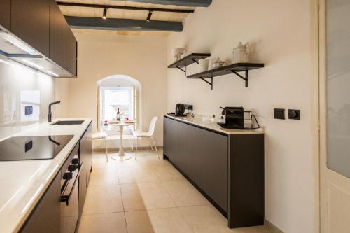 Kuchyň nebo kuchyňský kout v ubytování Valletta Central 131
