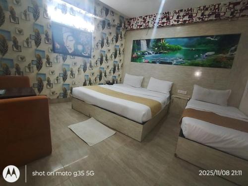 Ένα ή περισσότερα κρεβάτια σε δωμάτιο στο Hotel lavish Santuary