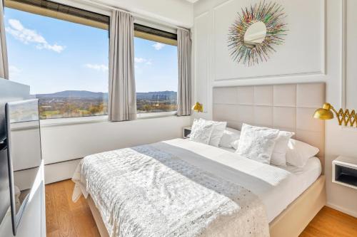 Postel nebo postele na pokoji v ubytování Free car parking Appartement- 25min to Downtown