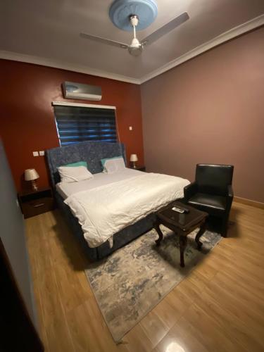 Ένα ή περισσότερα κρεβάτια σε δωμάτιο στο King David Guesthouse