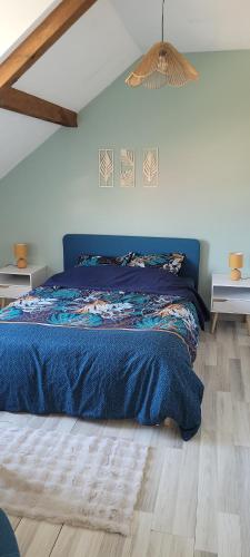 En eller flere senge i et værelse på Appartement proche Metz Luxembourg