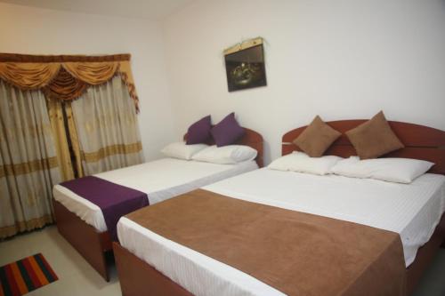 Postel nebo postele na pokoji v ubytování Enlivened Ella