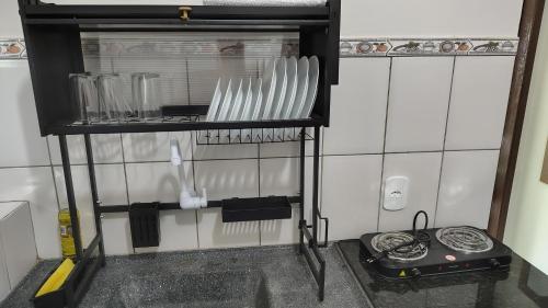 Η κουζίνα ή μικρή κουζίνα στο Espaço Acalanto