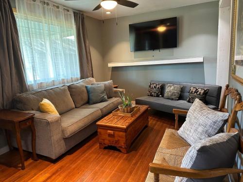 a living room with a couch and a table at New Leeds listing Near Graces diner and Hudson! in Catskill