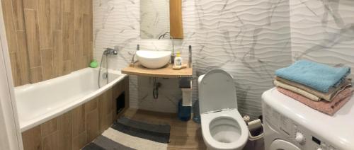 Ένα μπάνιο στο Затишна квартира поблизу автовокзалу та неподалік центру