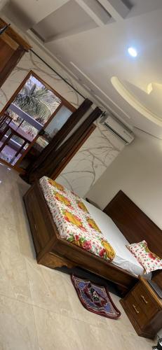 a room with two beds in a room at Keur Mame Coumba in Saint-Louis