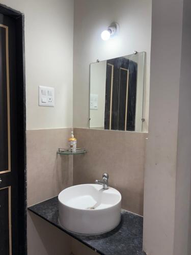 Ένα μπάνιο στο Silver Homes 1bhk Apartment Stay On 7th floor