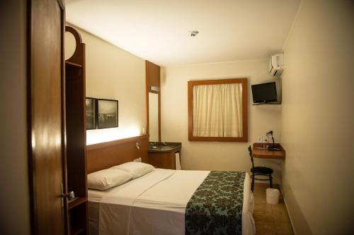 Voodi või voodid majutusasutuse Orion Hotel toas