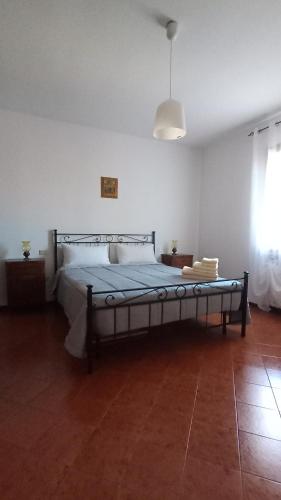 Postel nebo postele na pokoji v ubytování Agriturismo Carne Sicura