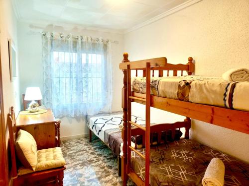 Giường trong phòng chung tại House with solarium