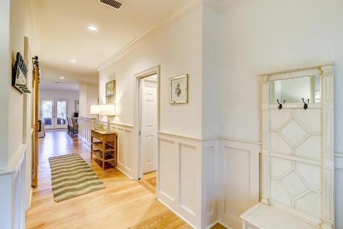 a hallway of a home with white walls at OG14: 14 Ocean Green in Kiawah Island