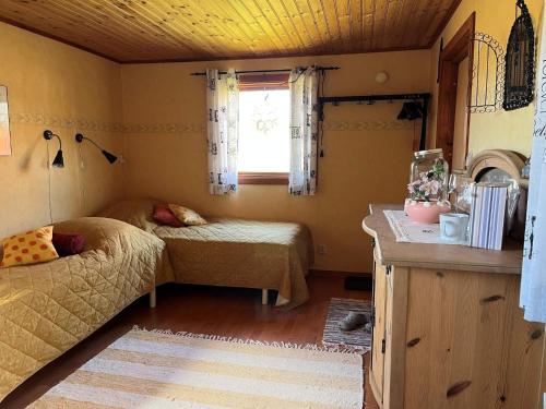 Ένα ή περισσότερα κρεβάτια σε δωμάτιο στο Family Retreat in Dalsland, Sweden