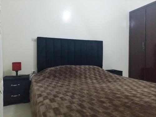 Ένα ή περισσότερα κρεβάτια σε δωμάτιο στο Kerouch house