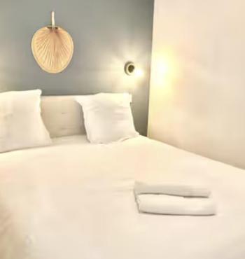 Llit o llits en una habitació de Cosy 1
