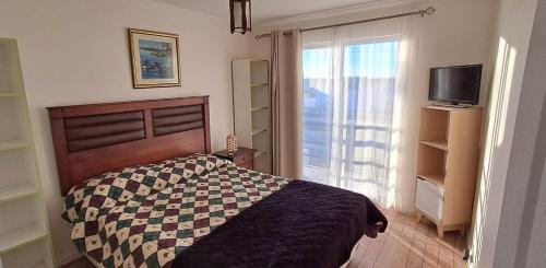 Postel nebo postele na pokoji v ubytování Casa Bahía Calderilla - Vista al Mar y Quincho Familiar