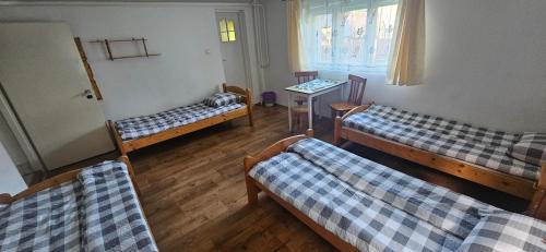 Postel nebo postele na pokoji v ubytování Noclegi Beskidzkie