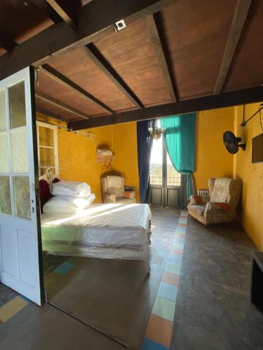 Ένα ή περισσότερα κρεβάτια σε δωμάτιο στο El Granero Apart hotel