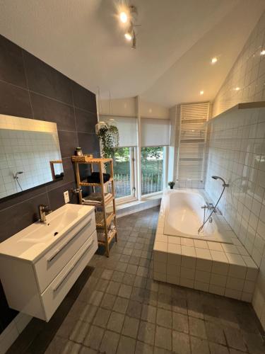 Koupelna v ubytování Vakantiehuisje Ommen