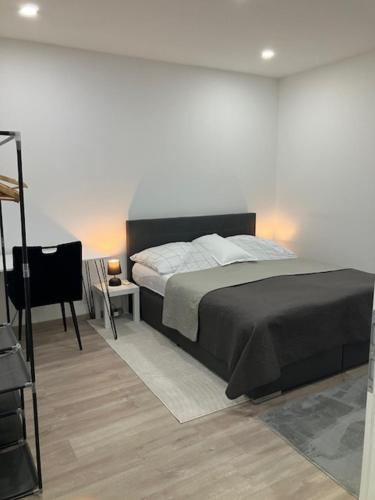 Postel nebo postele na pokoji v ubytování Moderne Einliegerwohnung nähe Ingolstadt und Bad Gögging