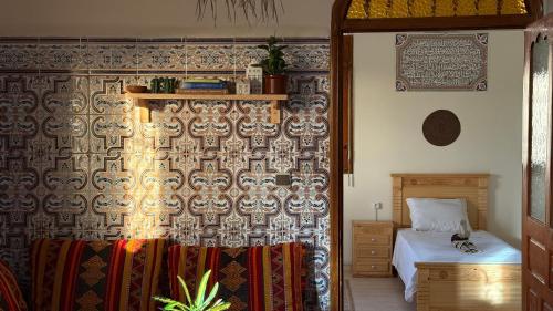 Postel nebo postele na pokoji v ubytování Tidmi Wave Anza