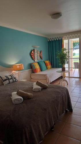 Ένα ή περισσότερα κρεβάτια σε δωμάτιο στο DESIRADE 18 sainte luce