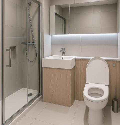 a bathroom with a toilet and a sink and a shower at Euston, Russel Square, Kings Cross Designer's Stay in London