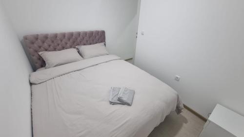 Ένα ή περισσότερα κρεβάτια σε δωμάτιο στο Apartmani A1-2