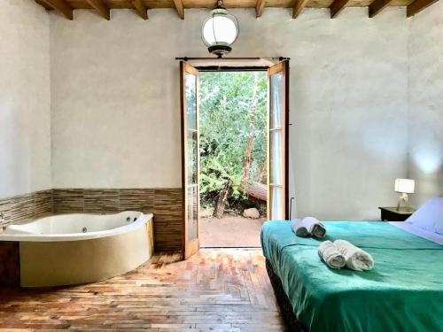 Postel nebo postele na pokoji v ubytování Rincón del Benítez