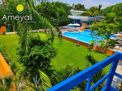 a view of the pool at embassy villa resort at Ameyali Teques in Tequesquitengo