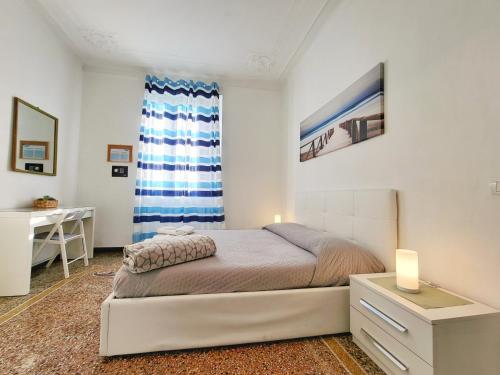 Postel nebo postele na pokoji v ubytování Brignole Home