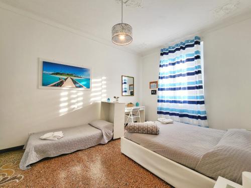 Postel nebo postele na pokoji v ubytování Brignole Home