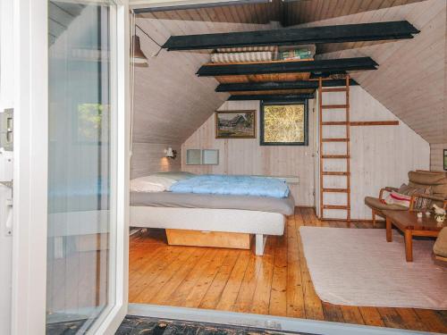 Ein Bett oder Betten in einem Zimmer der Unterkunft 6 person holiday home in Fanø-By Traum