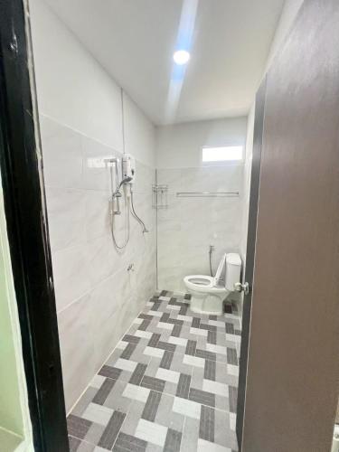 a bathroom with a shower and a toilet at Palm tree garden house NinemintoAonangbeach in Ao Nam Mao