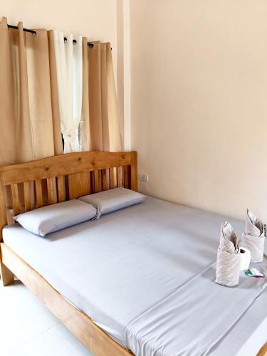 Postel nebo postele na pokoji v ubytování James homestay 2