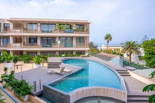 an image of a house with a swimming pool at The Magic Place - Ocean Walk and Pool Access in Anfa-Supérieur