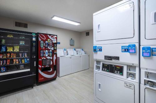 a store with a soda machine and other appliances at Extended Stay America Suites - Columbia - Greystone in Columbia