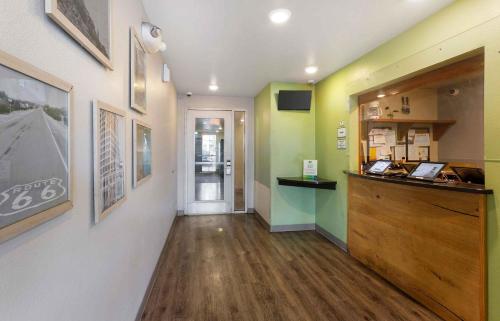 a hallway of a store with a counter in a room at Extended Stay America Select Suites - Phoenix - West in Phoenix