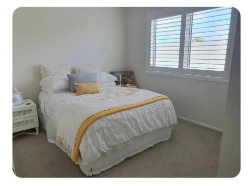 Postel nebo postele na pokoji v ubytování Sand Castle