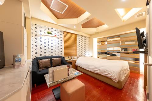 Postel nebo postele na pokoji v ubytování Hotel UKIUKI -Adult Only- 千葉中央