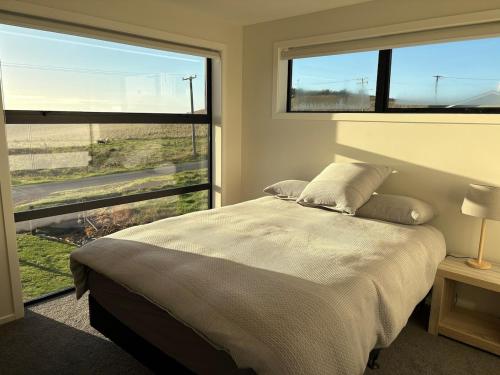 En eller flere senge i et værelse på The Boat House