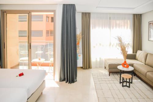 Ένα ή περισσότερα κρεβάτια σε δωμάτιο στο Eden Marrakech