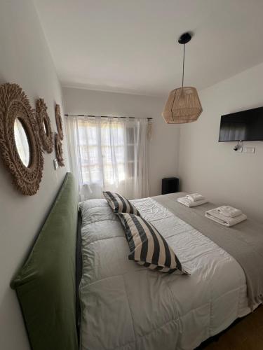 Voodi või voodid majutusasutuse Casa Estivariz Madryn toas