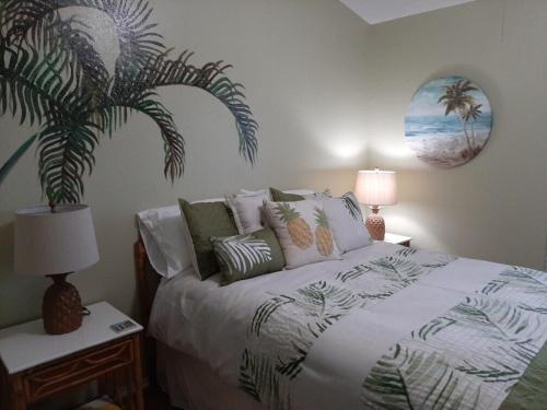 Postel nebo postele na pokoji v ubytování Island Cabana