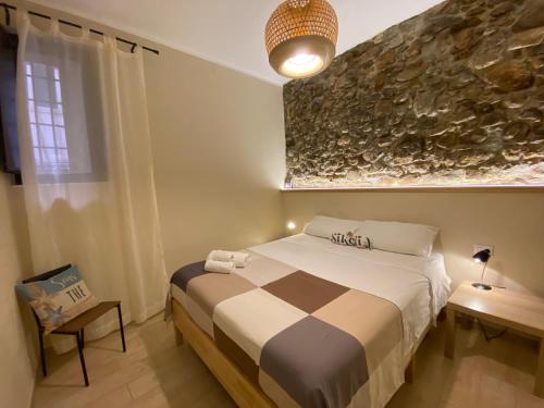 Postel nebo postele na pokoji v ubytování Sikelia House Cefalù