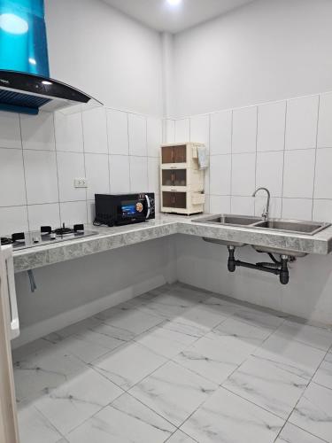 Kuchyň nebo kuchyňský kout v ubytování Cozy Corner