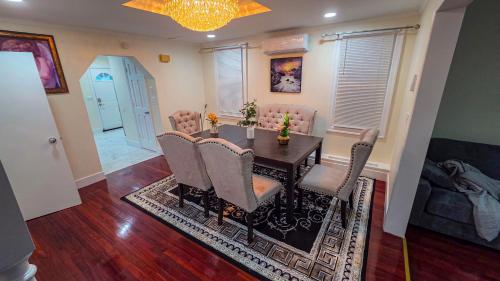 a dining room with a table and chairs at Amazing private single family house in Glendale